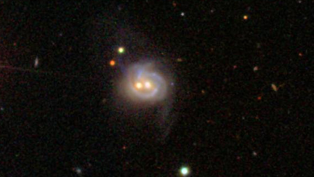 Monster Black Hole Twins Found Inside Galaxy's Belly